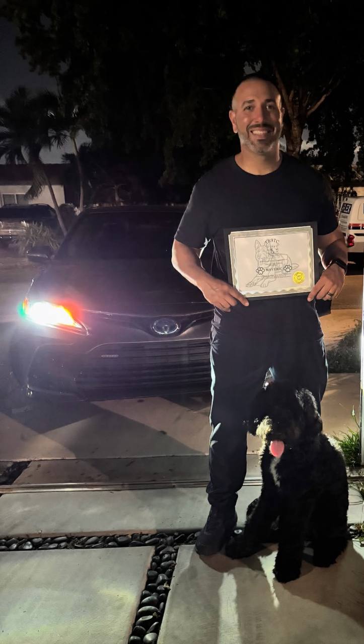 Client with Bear and a TK9 training certificate